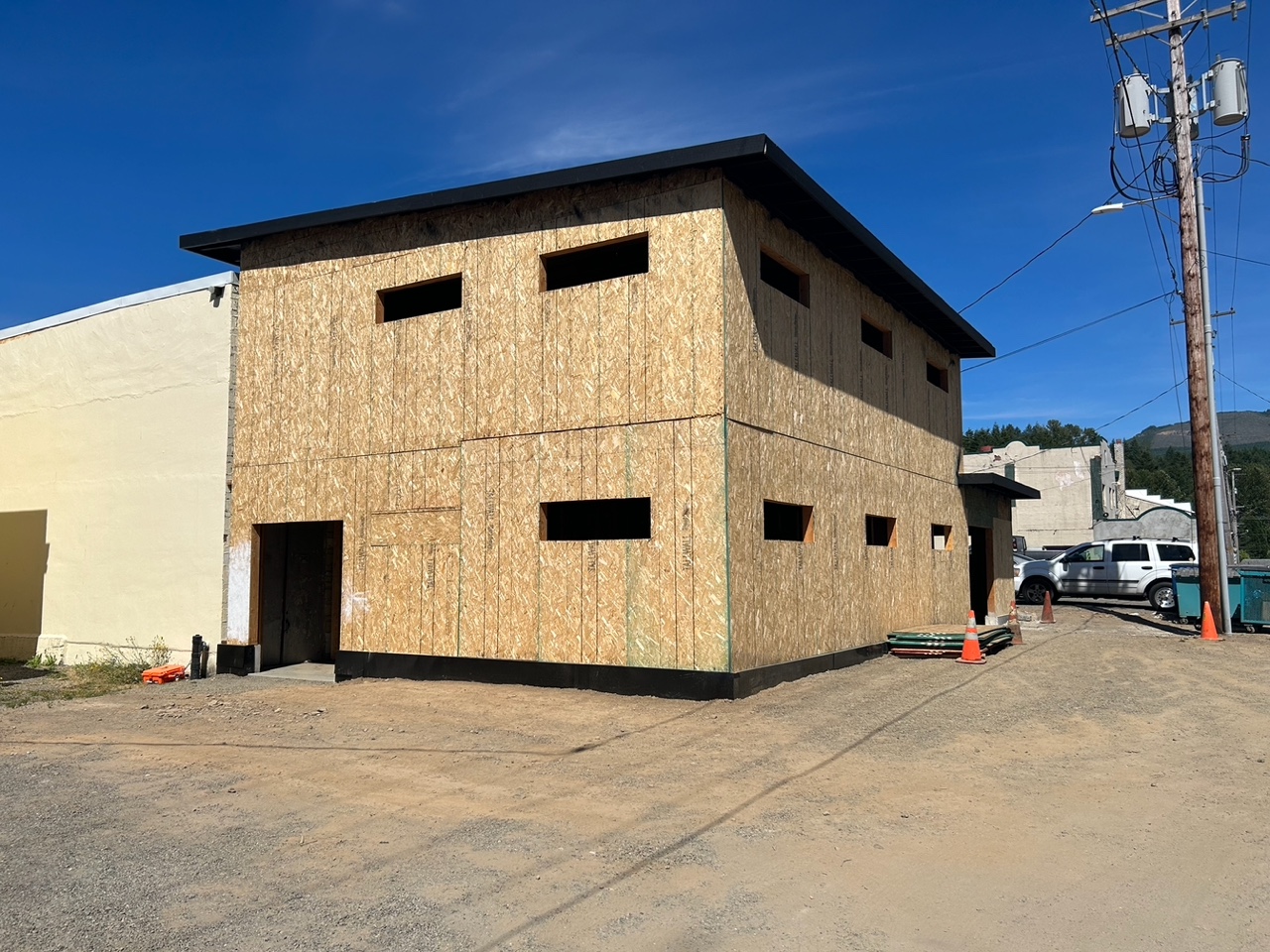 The Roxy addition is framed, sheathed, and ready for siding and roofing.