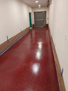 The new epoxy flooring in the south backstage hallway of the Roxy’s new addition.